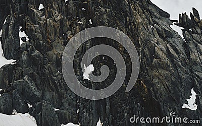 Cliffs and rocks of snow peaks in Chamonix Stock Photo