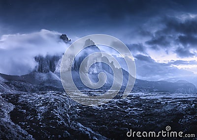 Mountains in fog at beautiful night. Dreamy landscape Stock Photo