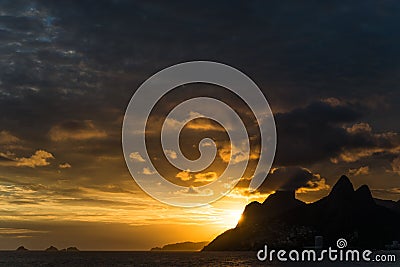 Mountains and Ipanema beach in Rio de Janeiro from Praia do Arpoador. Stock Photo