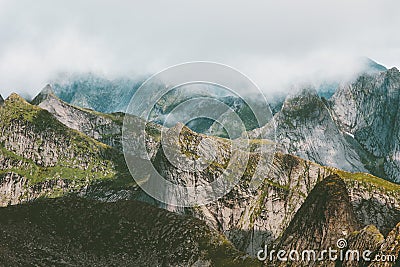 Mountains Landscape from Hermannsdalstinden summit in Norway foggy scandinavian Stock Photo