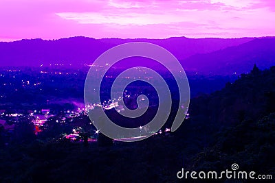 Dawn's Embrace: Serene Mountains and Rose Quartz Sunrise Stock Photo