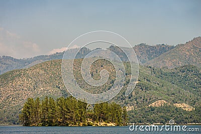 Mountains and small island at Whiskeytown Lake in Northern California Stock Photo