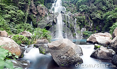 Mountainside waterfall Stock Photo