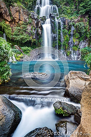 Mountainside waterfall Stock Photo