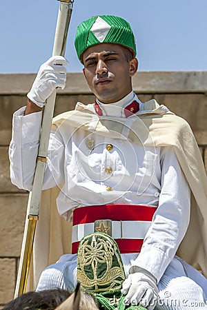 A mounted soldier at the 12th Century walled entrance to Hassan Tower in Rabat, Morocco. Editorial Stock Photo