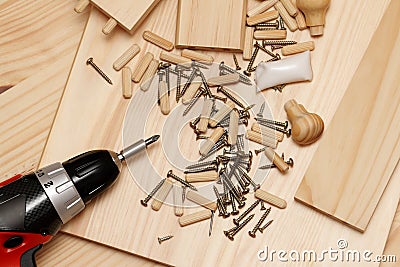 Mounting furniture with screwdriver Stock Photo