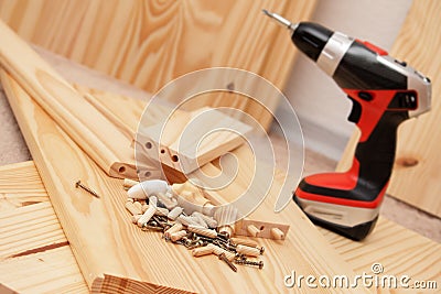 Mounting furniture with screwdriver Stock Photo