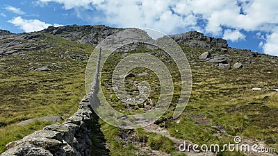 The mourne wall slieve binnian ireland Stock Photo