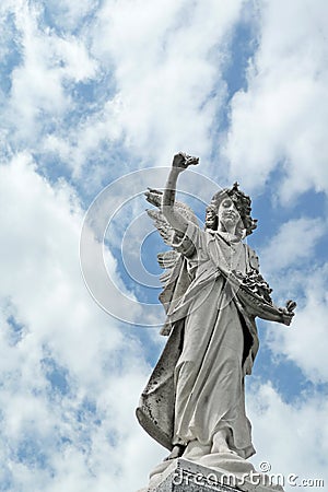 Mournful nineteenth century angel cemetery statue Stock Photo