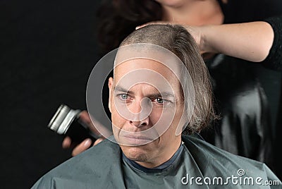 Mourning Man Getting Long Hair Shaved Off For Cancer Fundraiser Stock Photo