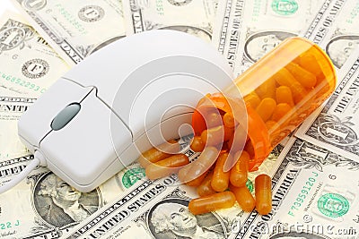 Mouse with a pills and money Stock Photo