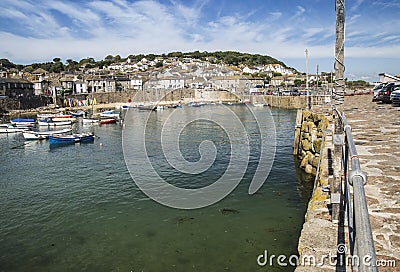 Mousehole Harbour and village in Cornwall Editorial Stock Photo