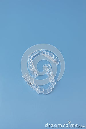 Mouth guard. Transparent dental aligners for man's maxillary and mandibular teeth on Stock Photo