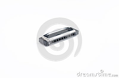 Mouth organ isolated on white background.Harmonica.Copy space Editorial Stock Photo