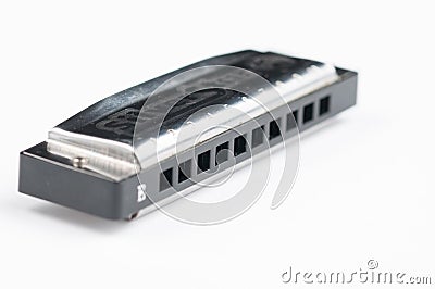 Mouth organ isolated on white background.Harmonica.Copy space Editorial Stock Photo