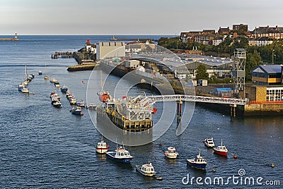 Mouth of the river Tyne with pontoon, various small boats at their moorings and br Stock Photo