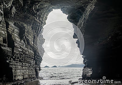 Mouth of Sangjogam cave the elected rock that its shape look like table in Sangjogam Country Park Stock Photo