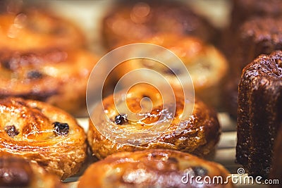 Delicious Danish spiral cinnamon raisin rolls Stock Photo