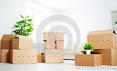 Move. lots of cardboard boxes in empty new apartment Stock Photo