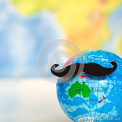 Movember beard word sign world map background Stock Photo