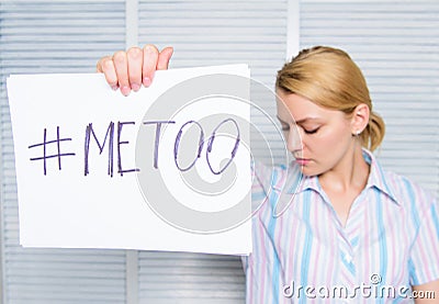 Movement against sexual harassment. Woman sad face hold poster hashtag me too. Victim of sexual assault and harassment Stock Photo