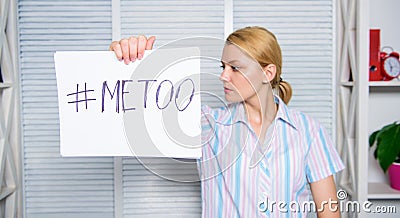 Movement against sexual harassment. Woman sad face hold poster hashtag me too. Victim of sexual assault and harassment Stock Photo