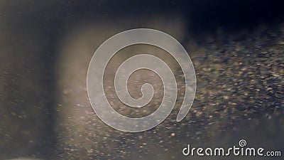 The movement of bokeh and dust particles with real lens flare, blue color tone. The movement of bokeh and dust particles with real lens flare. Abstract and The movement of bokeh and dust particles with real lens flare, blue color tone. The movement of bokeh and dust particles with real lens flare. Abstract and