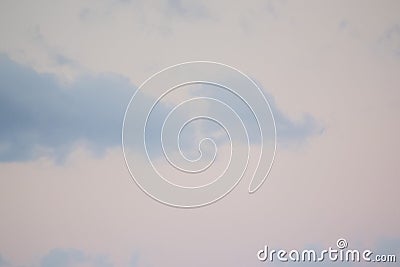 Movement of clouds in sky. Landscape movement large pink red clouds in blue sky Stock Photo