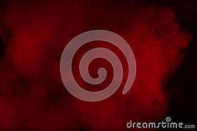 Movement of colorful smoke.Abstract red smoke on black background. Stock Photo