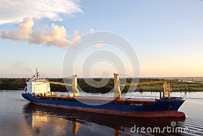 The movement of sea merchant ships and tugs to the entrance and exit from the port. Beaumont, Texas Stock Photo