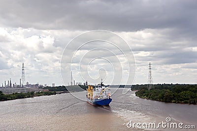 The movement of sea merchant ships and tugs to the entrance and exit from the port. Beaumont, Texas Stock Photo