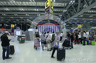 The movement of tourists inside of Suvarnabhumi Airport. Suvarnabhumi Airport is one of two international airports serving Bangkok Editorial Stock Photo