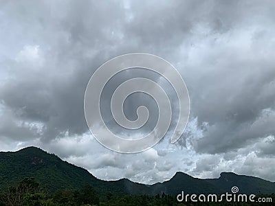 Movement white clouds on the black sky background Stock Photo