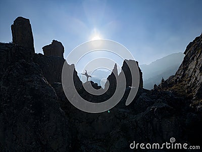 Movements of dynamic, free, adventurous and enthusiastic people in the mountains Stock Photo