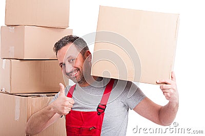 Mover man holding box and showing like gesture Stock Photo
