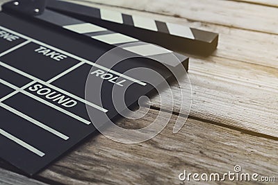 Movie clapper on wood table Stock Photo