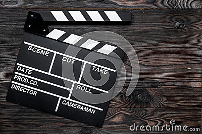 Movie clapperboard on wooden table background top view copyspace Stock Photo