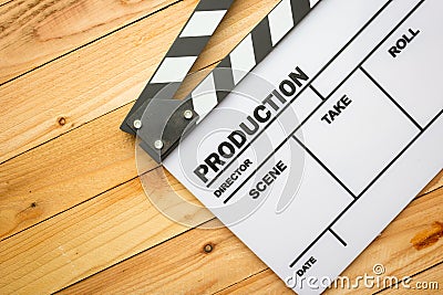 Movie slate film on wooden table Stock Photo