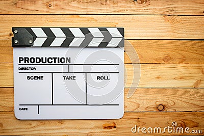 Movie slate film on wooden table Stock Photo