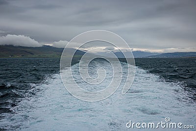 Moving boat in the sea, the land of fire and ice Stock Photo