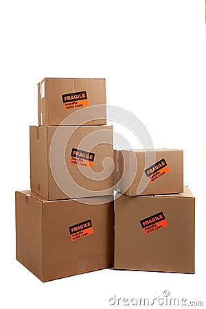 Moving boxes with fragile stickers Stock Photo