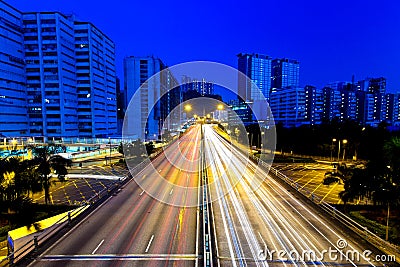 Moving cars on highway at night Stock Photo