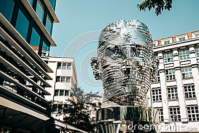 Moving mirror statue of Franz Kafka by David Cerny. Big metalmorphosis head sculpture. Editorial Stock Photo