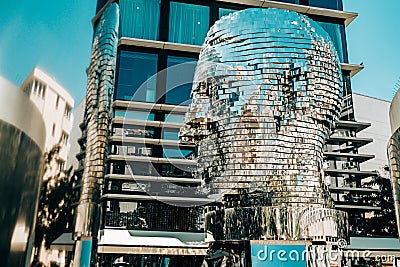 Moving mirror statue of Franz Kafka by David Cerny. Big metalmorphosis head sculpture. Editorial Stock Photo