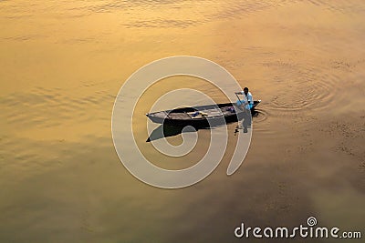 Moving moton of boatman I captured this image from Munshigonj, Bangladesh Editorial Stock Photo