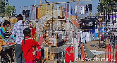 A moving shop for womens shop necllaces in trible fair,beneshwer dham fair Editorial Stock Photo