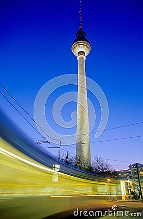 Moving Tram in front of Television Tower, Berlin Stock Photo