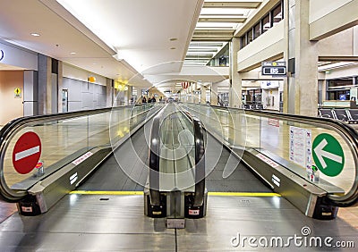 Moving walkway in the airport Editorial Stock Photo