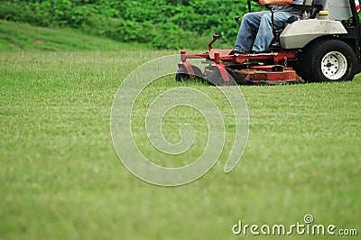 Mowing the lawn Stock Photo