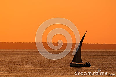 Mozambican dhow at sunset Stock Photo